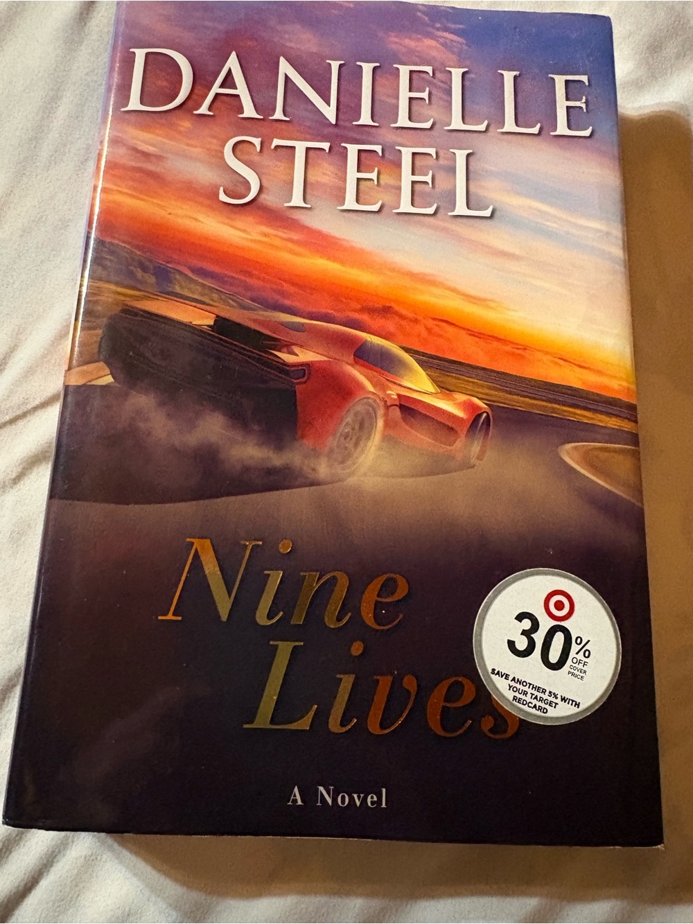 Danielle Steel Nine Lives - Hardcover Novel (Red/Orange Cover)